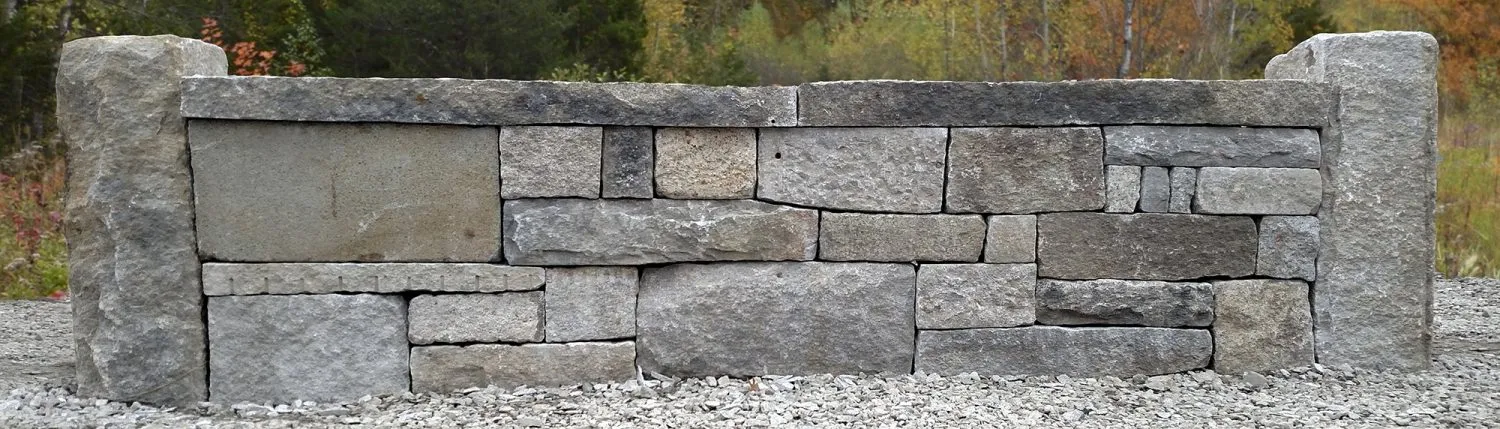 Reclaimed granite mock-up of wall